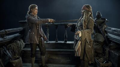 Brenton Thwaites, as Henry Turner, left, and Johnny Depp’s Captain Jack Sparrow in a scene from Salazar’s Revenge, the fifth instalment of the Pirates of the Caribbean movies. AP