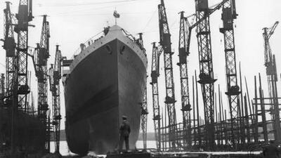 An ocean-going cruise liner rests in dry dock in England in 1924. Getty Images