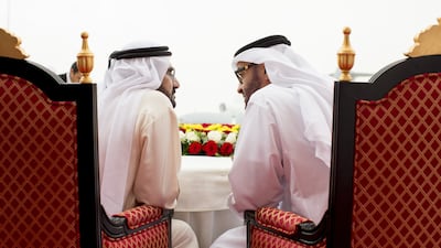 Sheikh Mohammed bin Zayed during a conversation with Sheikh Mohammed bin Rashid, Vice President and Prime Minister of the UAE and Ruler of Dubai, left, during the Dubai Airshow in 2013. Ryan Carter / Crown Prince Court - Abu Dhabi