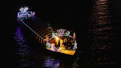 People on a boat take part in the New Year celebrations, in Cairo. Reuters