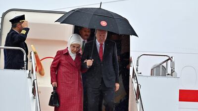 Turkish President Recep Tayyip Erdogan and his wife Emine Erdogan arrive. AFP