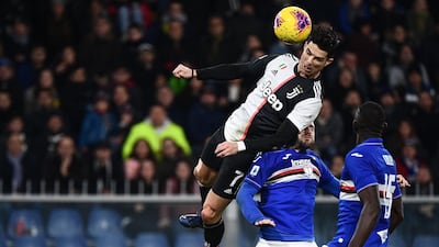 Ronaldo saors above the Sampdoria defence. AFP