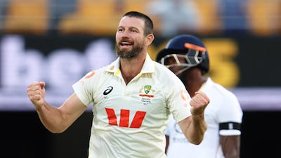 Australia's Michael Neser celebrates after taking the wicket of England batter Brydon Carse for seven. Reuters