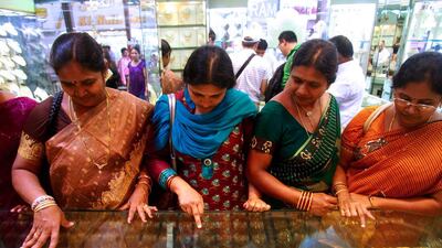 Tourists from India shop for jewellery in Dubai. A survey found tourists were attracted to the emirate’s ‘world-class facilities’. Gabriela Marj / Bloomberg