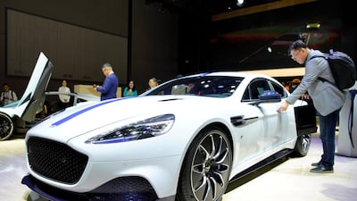 Aston Martin's Rapide E . The British luxury car maker saw demand for its vehicles plunge. Reuters