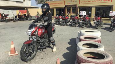 Kylie Slowe doing a lesson at Al Ahli Drving School to get her motorcycle driving license. Antonie Robertson / The National
