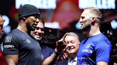 Anthony Joshua, left, and Otto Wallin of Sweden face-off. Getty Images
