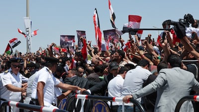 Fans welcome the Egyptian players. The team lost 3-2 to Argentina, having been 2-0 up with 10 minutes of the match remaining. Reuters