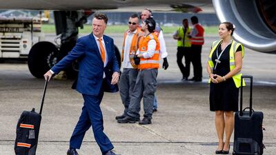 Netherland's football coach Louis van Gaal arrives at Rotterdam-The Hague airport in Rotterdam, on July 13, 2014. Van Gaal starts as Manchester United manager this week. AFP PHOTO / ANP / SANDER KONING