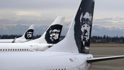 Alaska Airlines planes line-up at the terminal at Seattle-Tacoma International Airport. AP Photo