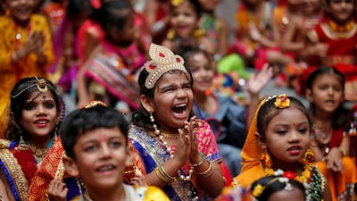 Children celebrate Janmashtami festival, marking the birth anniversary of Hindu Lord Krishna, at a school in Ahmedabad, India. Reuters