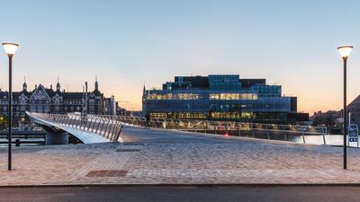 Lille Langebro curves across a body of water. Photo: Rasmus Hjortshoj / WilkinsonEyre