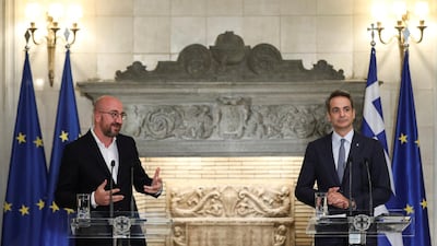 European Council President Charles Michel and Greek Prime Minister Kyriakos Mitsotakis attend a news conference in Athens on September 15. Reuters