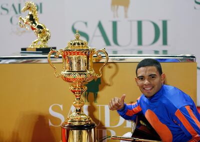 Jockey Luis Saez with the trophy after winning the Saudi Cup in Riyadh. AP