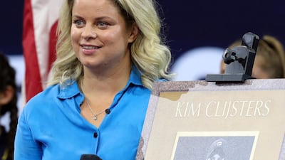 Former Belgian tennis player and US Open champion Kim Clijsters is honoured with a plaque in Arthur Ashe Stadium before the start of the Catherine McNally versus Serena Williams match. EPA