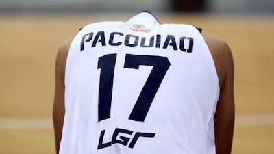 Manny Pacquiao sits on the bench during the Maharlika Pilipinas Basketball League's 'Dubai Invasion 2019' event at Hamdan Sports Complex in Dubai.