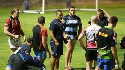 UAE Shaheen coach Apollo Perelini, centre, is entrusted to lead the development of Emirati rugby players. Pawan Singh / The National