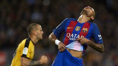 Neymar was the only member of Barcelona's famed front three to play in the goalless draw against Malaga. Manuel Queimadelos Alonso / Getty Images