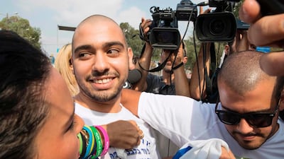 Israeli soldier Elor Azaria, who was convicted of manslaughter and sentenced to 18 months imprisonment for killing a wounded and incapacitated Palestinian assailant, arrives at the Trsifin military prison in Rishon Lezion, on August 9, 2017. Azaria was released on Tuesdayafter serving nine months of his original 18 month sentence. Jack Guez / AFP