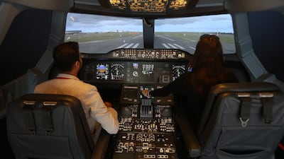 Sameera Fernando, left, instructs Rebecca McLaughlin-Duane on take-off. Pawan Singh / The National