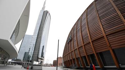 People go about Piazza Gae Aulenti in Milan. AFP