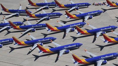 Southwest Airlines-liveried Boeing 737 MAX aircraft are parked on the tarmac at the Southern California Logistics Airport in Victorville, California. The 737 Max has been grounded since March after two fatal crashes. AFP