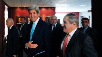 US secretary of State John Kerry, centre, Jordan's foreign minister Nasser Judeh, right, and Egypt's foreign minister Mohammed Kamel Amr, left, arrive for a meeting with the Arab League Peace Initiative in Amman.