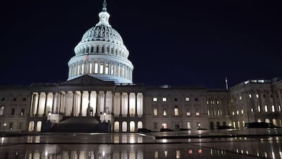 The US Capitol in Washington is seen in the evening hours last week. The Senate continues to debate the latest Covid-19 relief bill. Getty Images