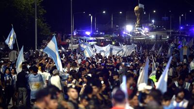 Supporters wait the arrival of Argentina's World Cup winning team at the Argentinian Football Association headquarters. AFP