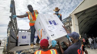 AstraZeneca Covid-19 vaccine doses provided by the Covax initiative arrive in Mogadishu, Somalia. AP