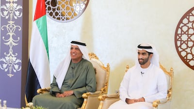 Sheikh Saud bin Saqr Al Qasimi watches an online wedding ceremony to celebrate the marriage of Sheikh Mohamed bin Sultan bin Khalifa Al Nahyan (not shown) and Sheikha Fatima bint Tahnoun bin Zayed Al Nahyan (not shown), at the Sea Palace on October 27.