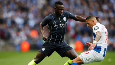 Manchester City's Benjamin Mendy in action with Brighton's Anthony Knockaert. Reuters
