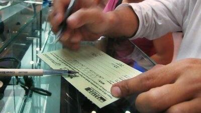 Expats sending money back to the euro zone have had the spending power of the dirhams they earn boosted by the slide of the euro. Delores Johnson / The National