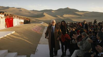 Pierre Cardin at the finale of his fashion show, in the desert of Whistling Sand Mountain on the outskirts of Dunhuang in China's northwest Gansu province, in October 2007. AFP
