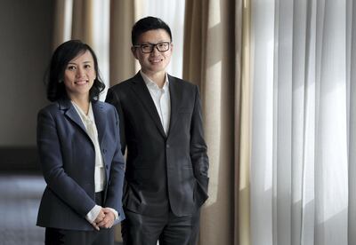 Didi Chuxing chief executive Jean Liu and vice president of strategy Stephen Zhu. Daily rides booked through the company's app are now above pre-pandemic levels. Chris Whiteoak / The National