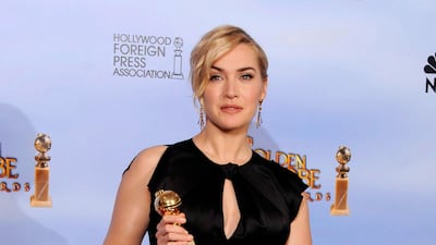 British actress Kate Winslet poses with her Golden Globe award for Best Performance by an Actress In A Mini-series or Motion Picture Made for Television in 'Mildred Pierce' at the 69th Golden Globe Awards. EPA/PAUL BUCK
