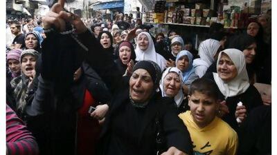 Mourners in the funeral procession of the protesters who killed when Israeli soldiers opened fire on Sunday at Palestinian crowds who approached the northern Israeli border with Lebanon, at Ein el-Hilweh Palestinian refugee camp, in the port city of Sidon, Lebanon, yesterday. Mohammed Zaatari / AP Photo