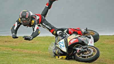 Zackary Johnson of Victoria crashes his Yamaha R6 as he competes in the Australian Supersport Championship - round 1 qualifying session ahead of the 2018 Superbikes at Phillip Island Grand Prix Circuit. Scott Barbour / Getty Images