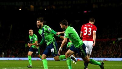 Charlie Austin (L) of Southampton celebrates scoring his team’s first goal with his team mate Shane Long (R) during the Barclays Premier League match between Manchester United and Southampton at Old Trafford on January 23, 2016 in Manchester, England. (Photo by Michael Steele/Getty Images)