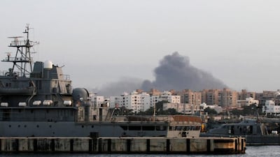 Smoke rises during heavy clashes between rival factions in Tripoli, on May 26, 2017. Reuters