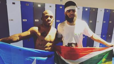 Somali-British MMA fighter Muhidin Abubakar, left, alongside South Africa's Luthando Biko following their bout at UAE Warriors 32: Africa 3. Photo: UAE Warriors