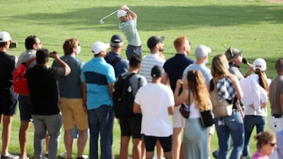 Rory McIlroy hits an approach shot during day three of the Slync.io Dubai Desert Classic. Getty