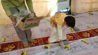 Ghaith Ismail takes part in one of the Emirates Red Crescent’s 30 volunteering missions across the UAE. Wam