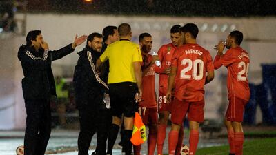 Real Madrid coach Santiago Solari gestures as his players drink during the Spanish King's Cup match against UD Melilla. AFP