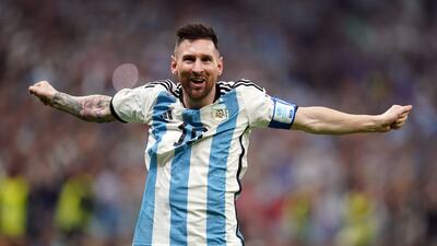 Lionel Messi celebrates scoring Argentina's third goal. PA