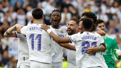 Real Madrid's Marco Asensio, Rodrygo, Eduardo Camavinga and teammates celebrate after winning La Liga with a 4-0 victory against Espanyol. Reuters