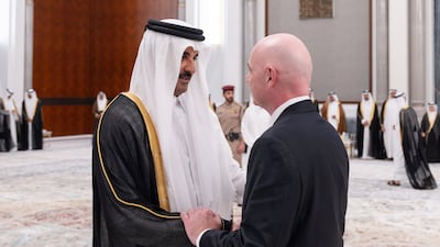 Sheikh Tamim with Fifa president Gianni Infantino, who is among the figures to offer condolences in Qatar. AFP