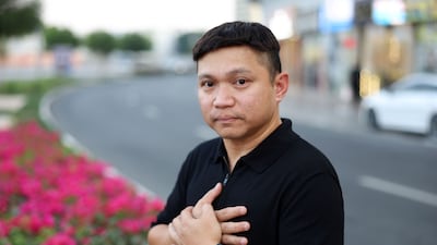 Godfrey Abello, a 44-year-old cyclist, talks about his heart attack on World Heart Day in Al Barsha, Dubai. Chris Whiteoak / The National