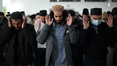 Members of the Ahmadiyya Muslim Community attend Friday prayers at the Baitul Futuh Mosque in Morden, south west London. AFP