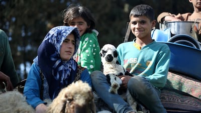 Internally displaced people from various areas under YPG control arrive to Qestel Cindo, recently captured by the Free Syrian Army. Aref Tammawi / EPA